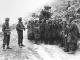 065 Cassino Gr Upper Hutt German prisoners captured by NZ troops beside a Sherman tank.