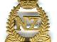 286 Florence Dr LMC Palm Nth Cap insignia of NZ Troops entering Florence2